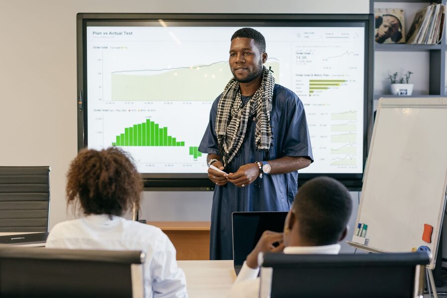 Executive on a conference call in a boardroom