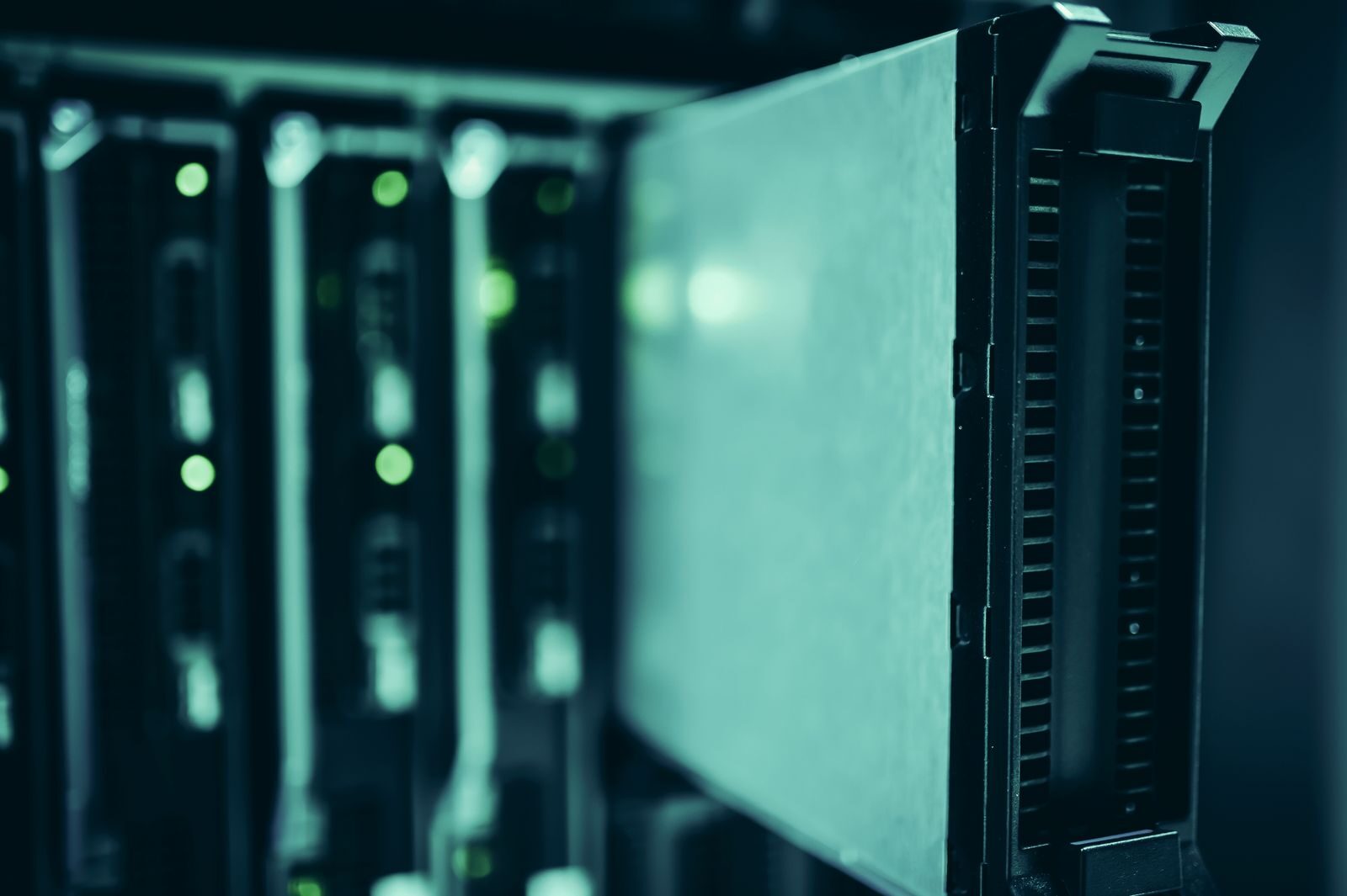 Rows of server racks in a data centre aisle